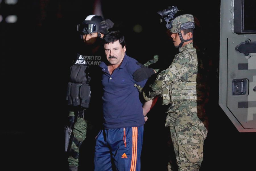 Joaquín ‘El Chapo’ Guzmán escorted by Mexican soldiers in Mexico City in 2016. 
Photo Credit to Tomas Bravo, Reuters