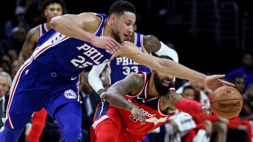 76ers forward Ben Simmons steals the ball from Wizards forward Markieff Morris during the second quarter