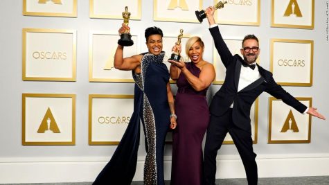 Left to right: Mia Neal, Jamika Wilson, and Sergio Lopez-Rivera, winners of the award for best makeup and hairstyling for Ma Raineys Black Bottom, pose in the press room at the Oscars on Sunday, April 25, 2021, at Union Station in Los Angeles. (AP Photo/Chris Pizzello, Pool, courtesy of CNN)