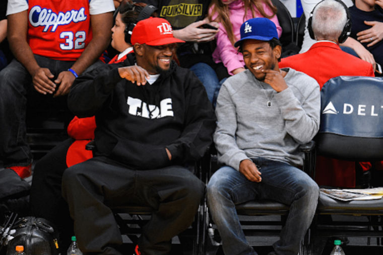 Rapper+Kendrick+Lamar+and+Top+Dawg+Entertainment+CEO+Anthony+Tiffith+attend+an+NBA+game+together+in+2015