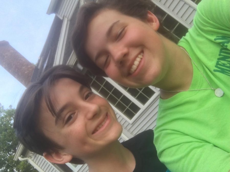 While attending camp this summer, Amelia has fun with her friend Calvin, who is also a counselor.