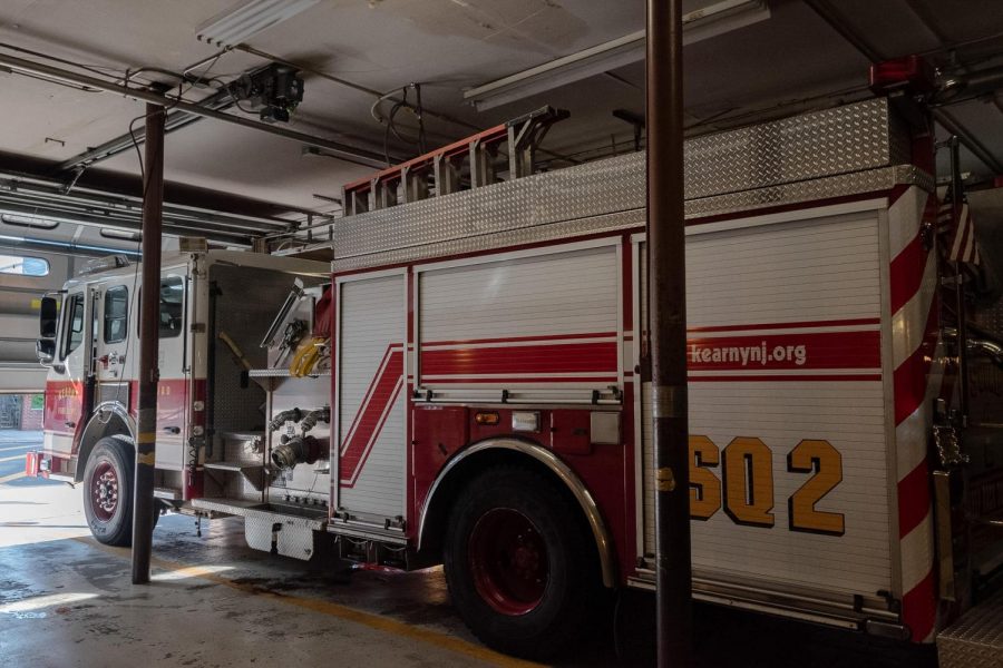 While visiting the fire department in Kearny, New Jersey, Audrey tours the building and views fire trucks.