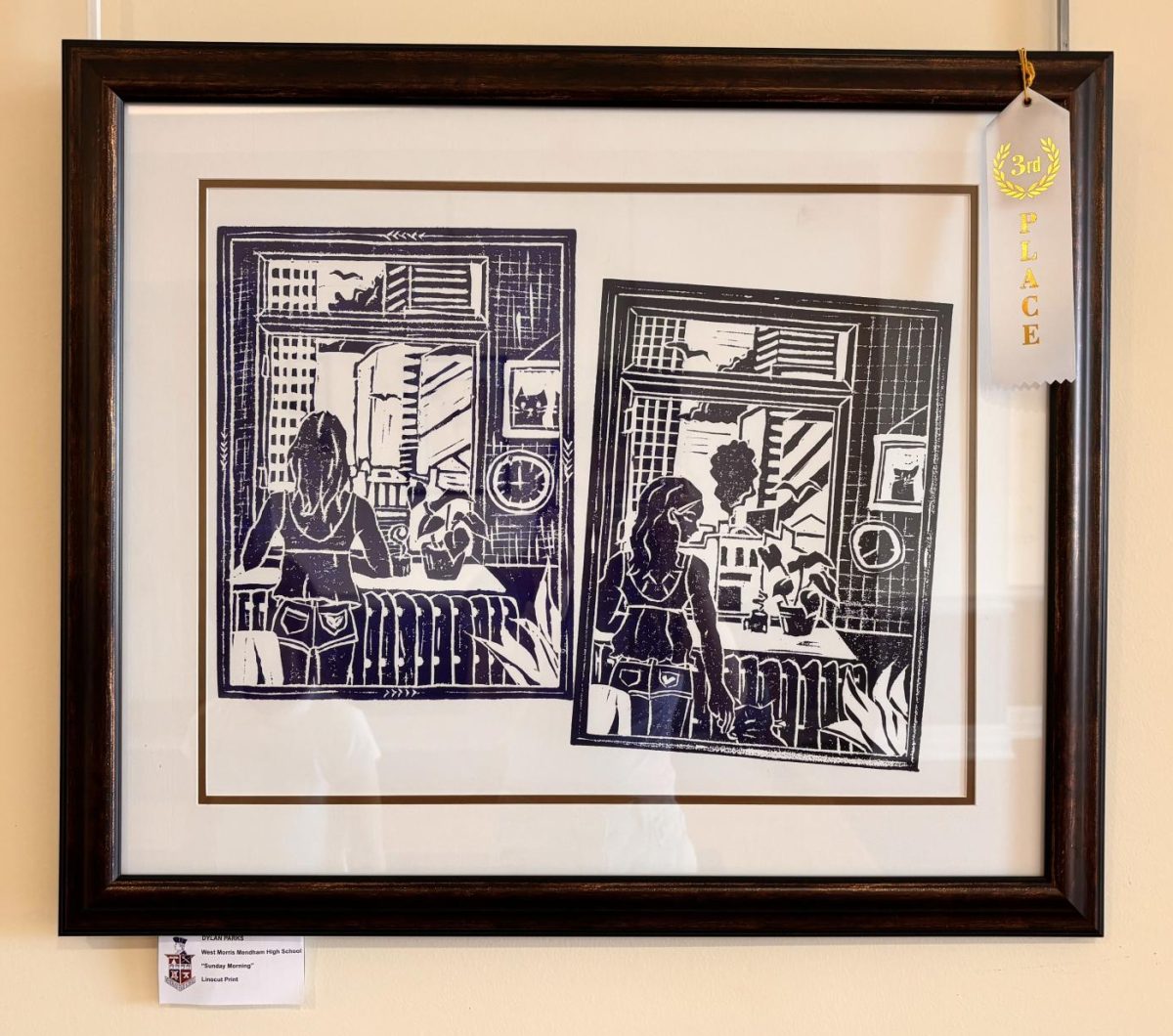 Dylan Parks’ linocut print, Sunday Morning, wins a 3rd place ribbon in the printmaking category. 