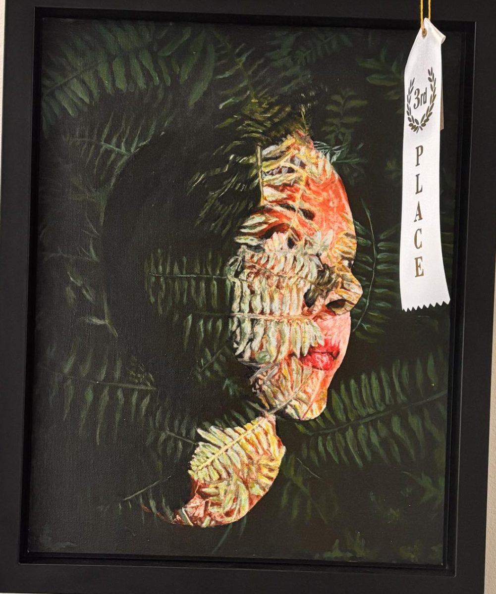 Lindsey Charlotte’s Self Portrait wins 3rd place for the portraiture category.