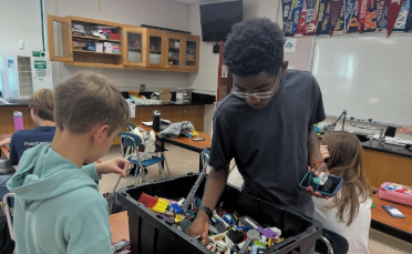 The LEGO Club’s members look for the perfect brick. Photo courtesy of WMM Lego Club Instragram.